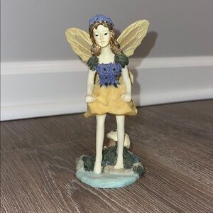 Yellow and Purple Fairy Figurine